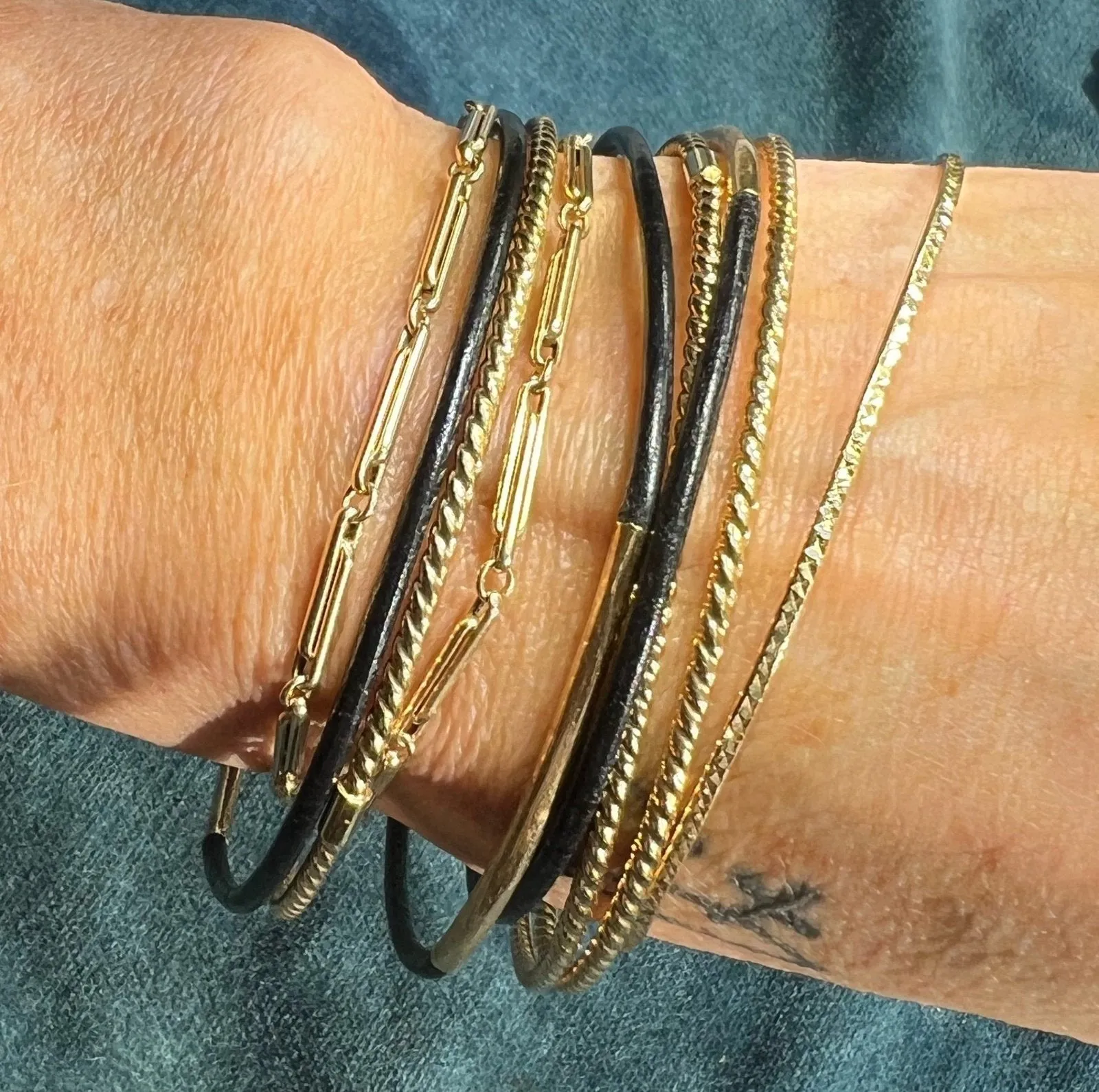 14k Yellow Gold and Black Leather Slip-On Bangles. Set of 3