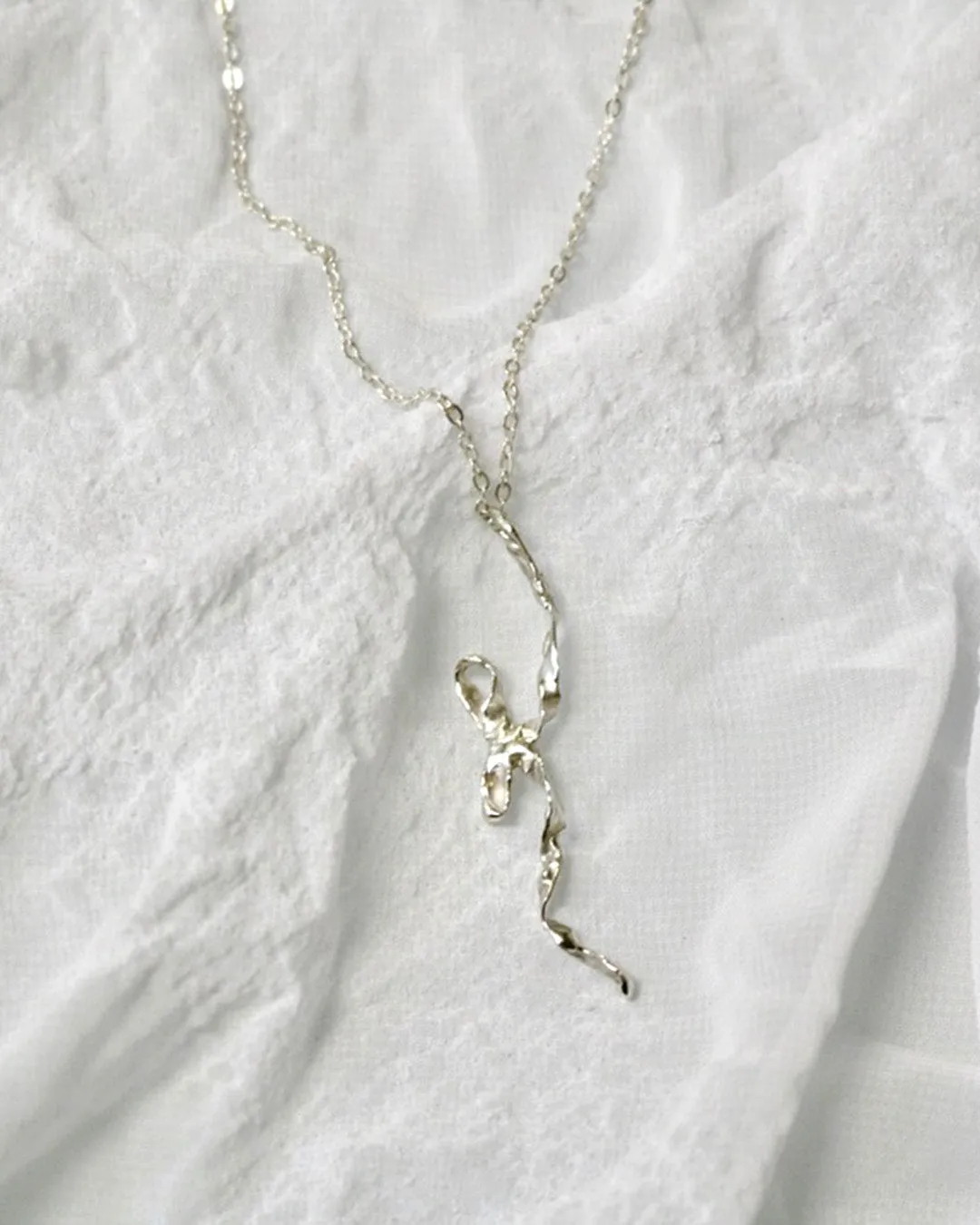 Burnt Bow Pendant - Silver