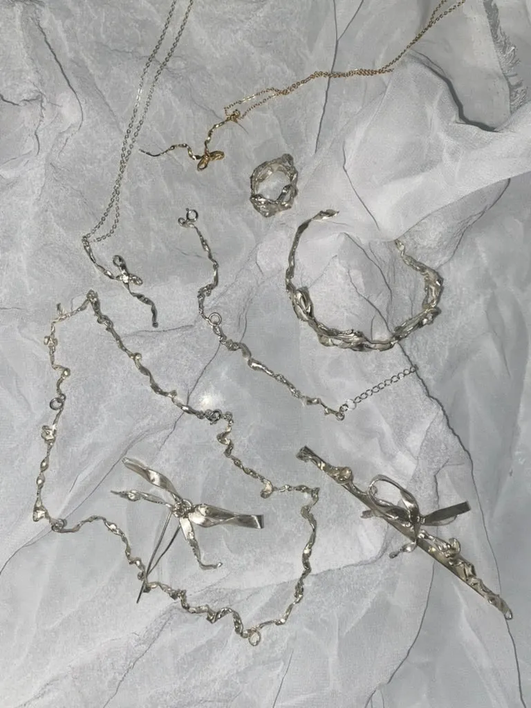 Burnt Bow Pendant - Silver