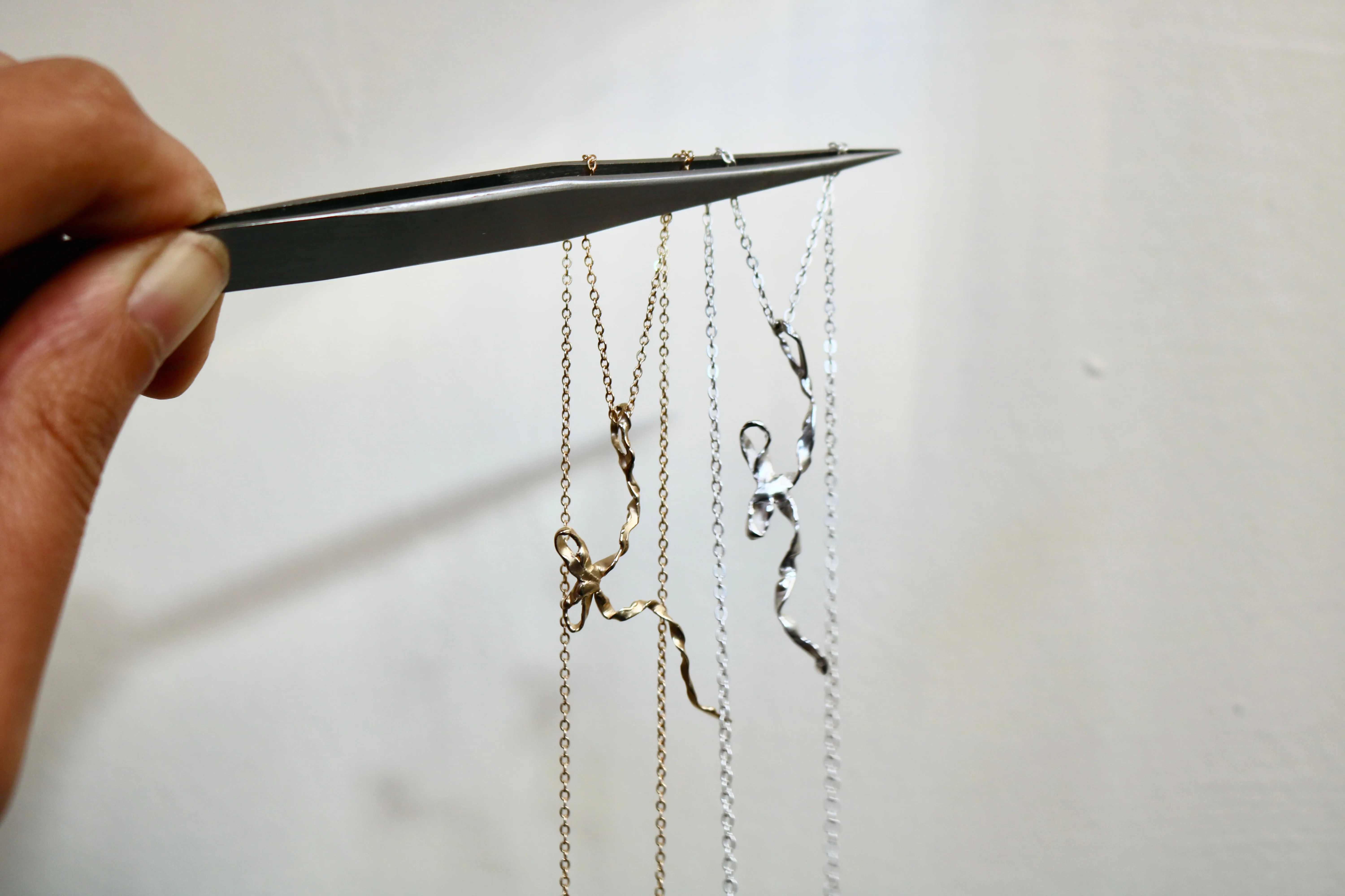 Burnt Bow Pendant - Silver