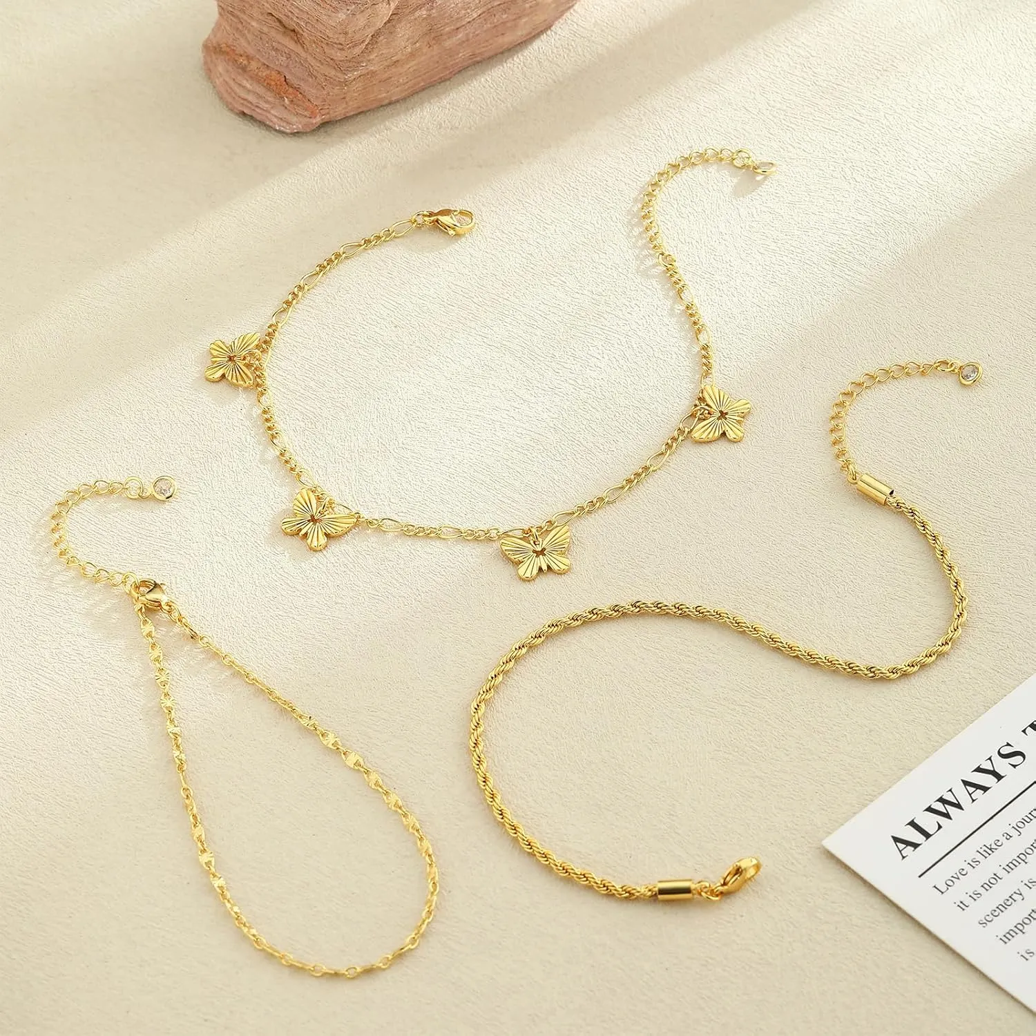 CAROVO Gold Ankle Bracelets for Women 14K Real Gold Plated Layered Anklet Waterproof Set Snake Sparkly Cuban Link Figaro Bead Paperclip Butterfly Chain Stackable Anklets Set Beach Jewelry for Women