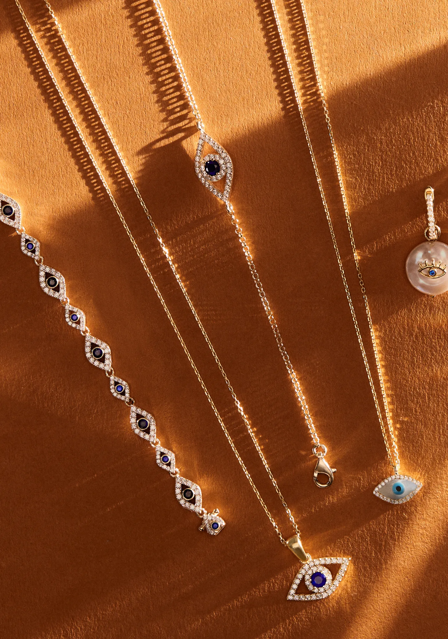 Elliptical Evil Eye Necklace Dipped in Gold