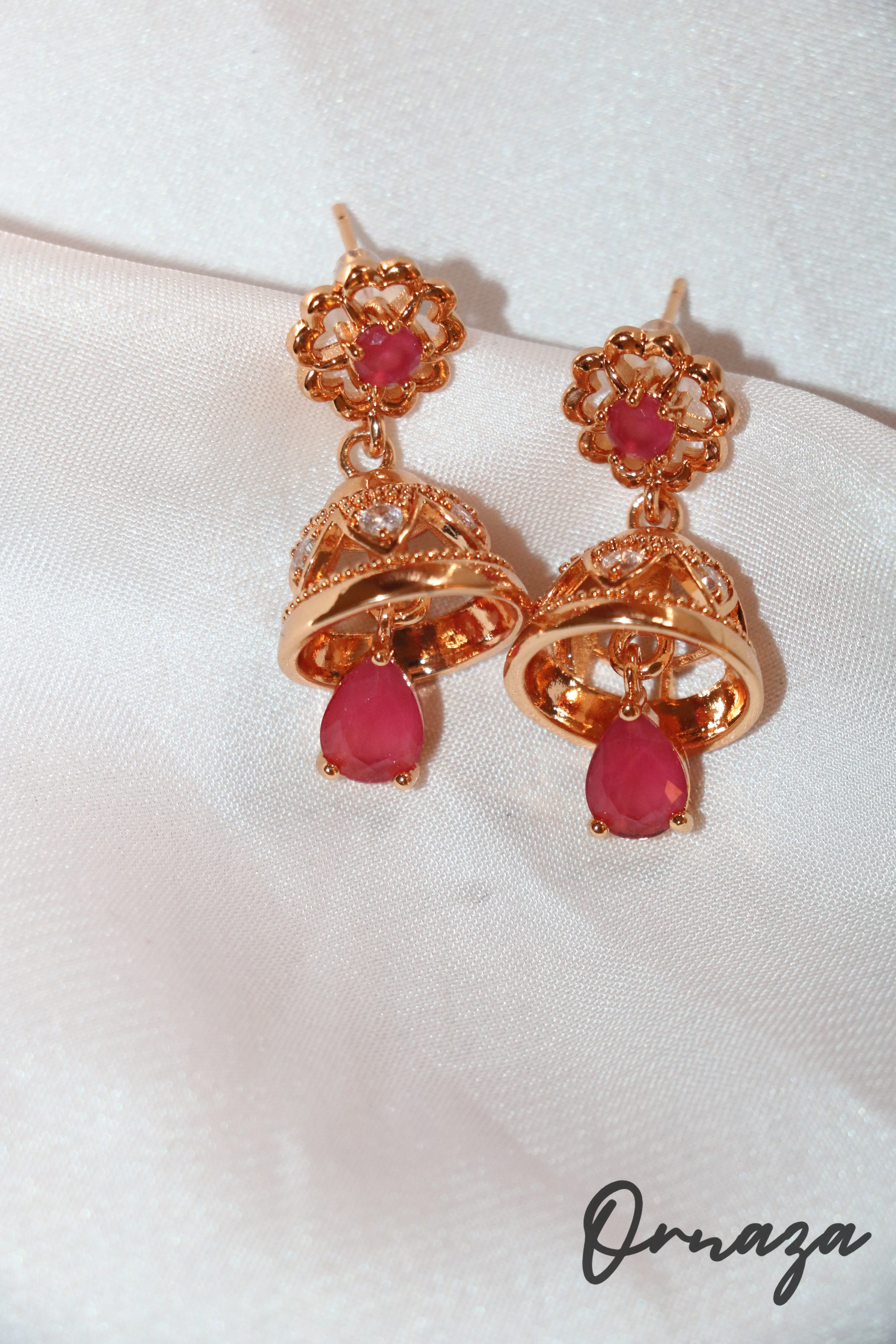Gold-Plated Floral Jhumka Earrings with Ruby Red Accents – A Blend of Tradition and Elegance
