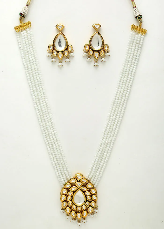Gold Plated Kundan Jewellery Set With White Beads