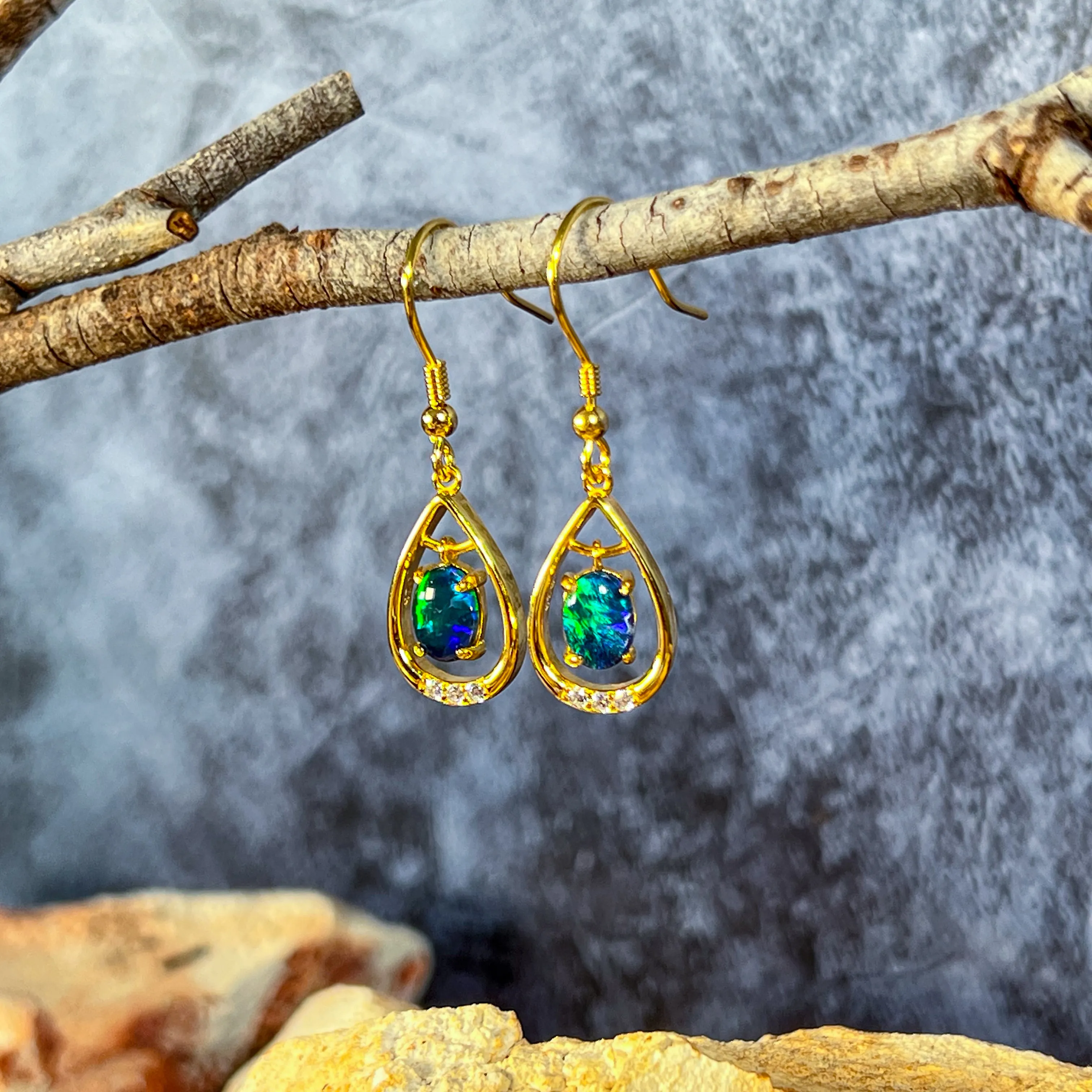 Gold Plated sterling Silver dangling pear shape earrings with two 7x5mm Opals