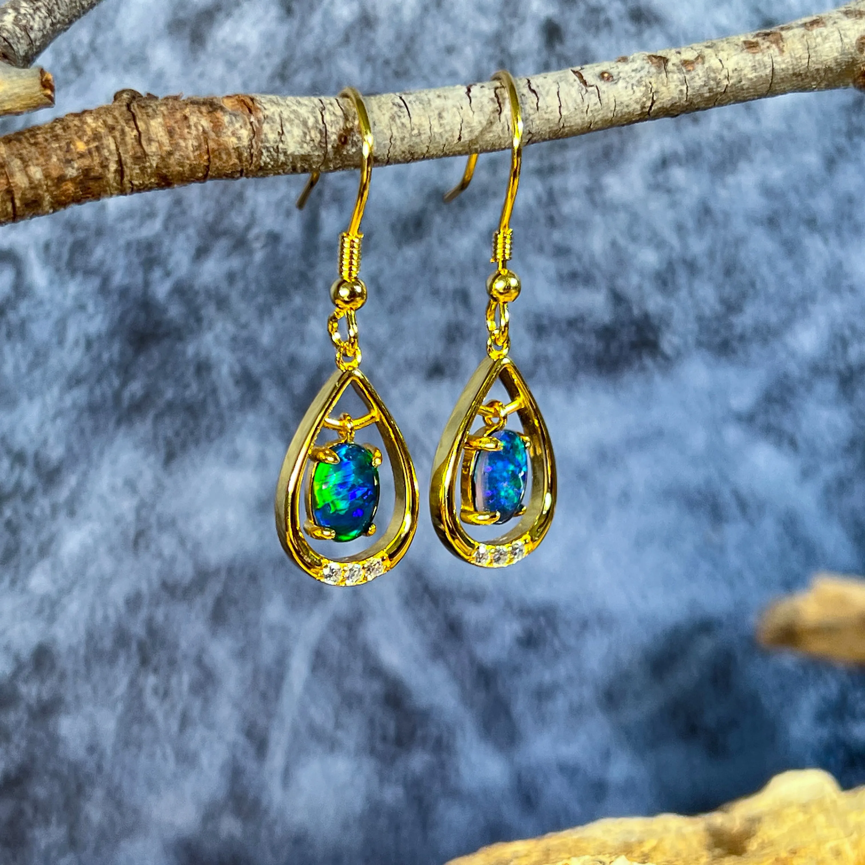 Gold Plated sterling Silver dangling pear shape earrings with two 7x5mm Opals