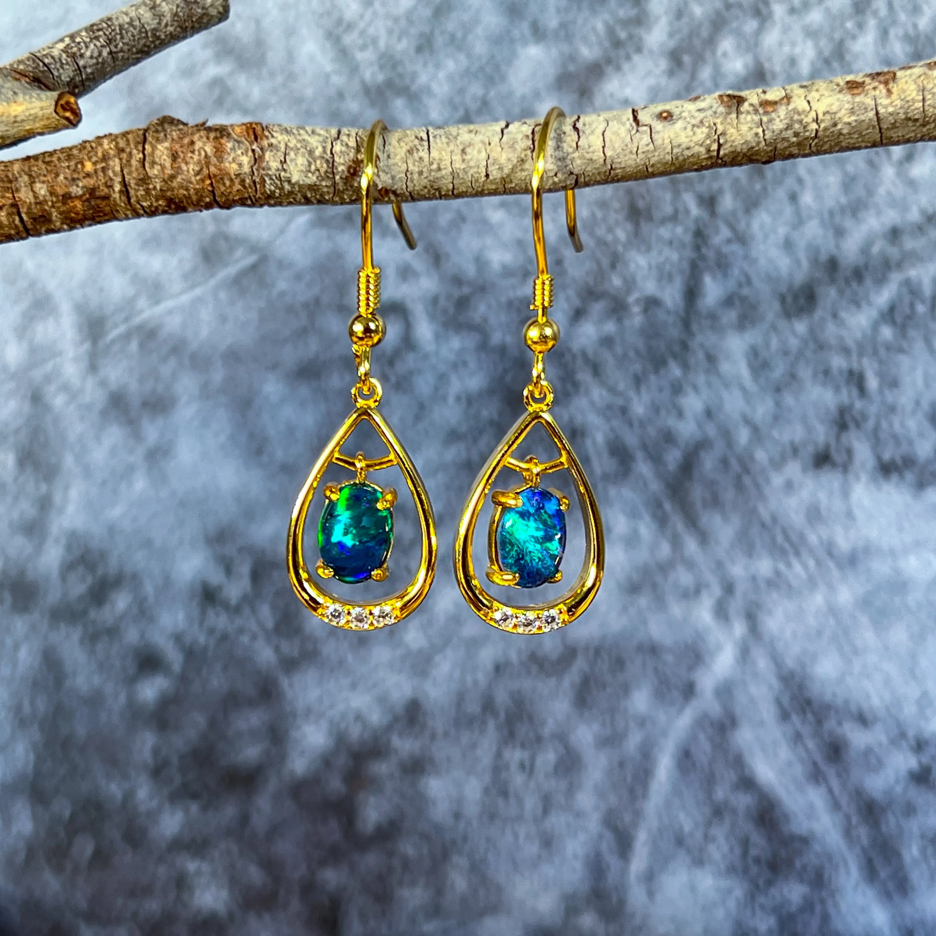 Gold Plated sterling Silver dangling pear shape earrings with two 7x5mm Opals