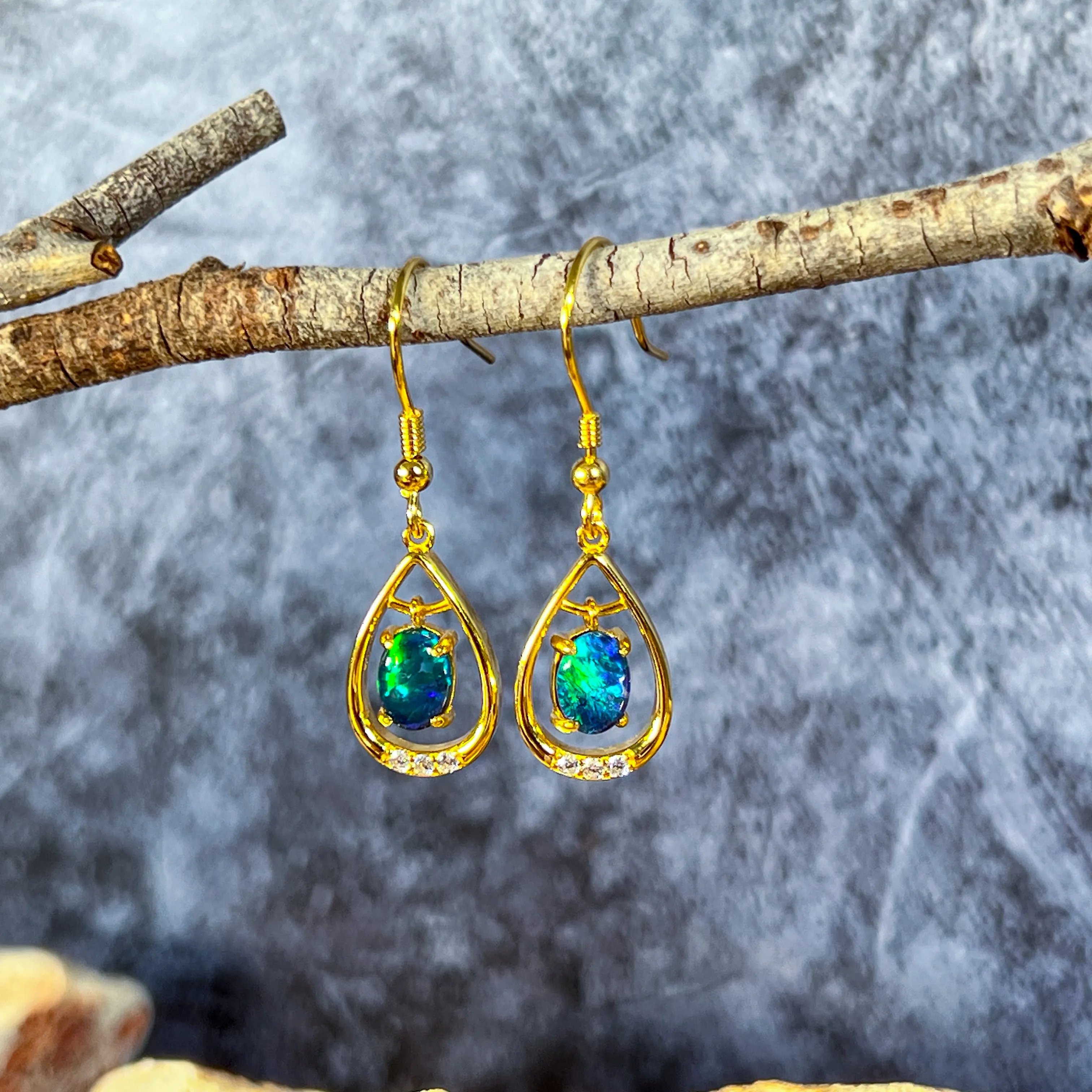 Gold Plated sterling Silver dangling pear shape earrings with two 7x5mm Opals