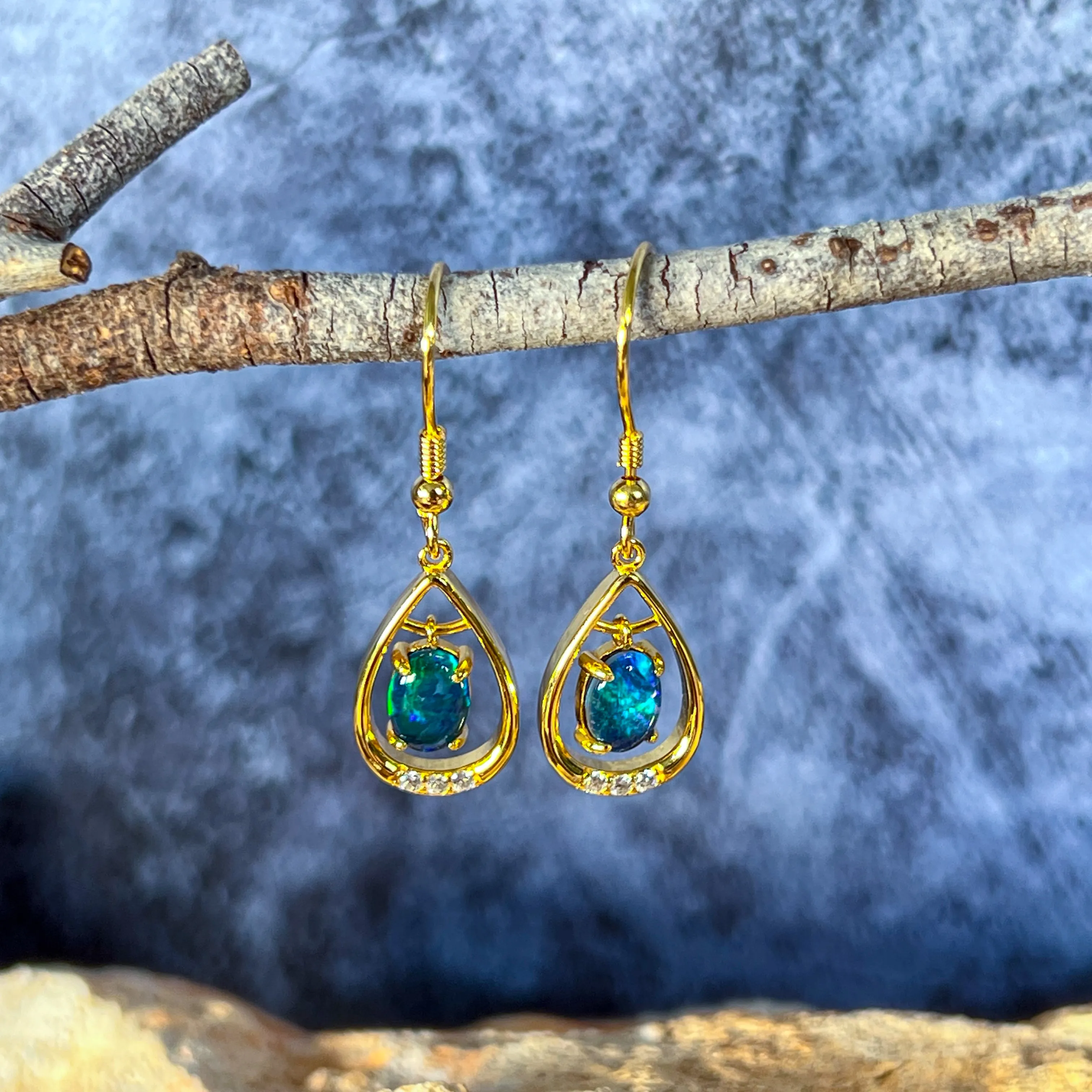 Gold Plated sterling Silver dangling pear shape earrings with two 7x5mm Opals