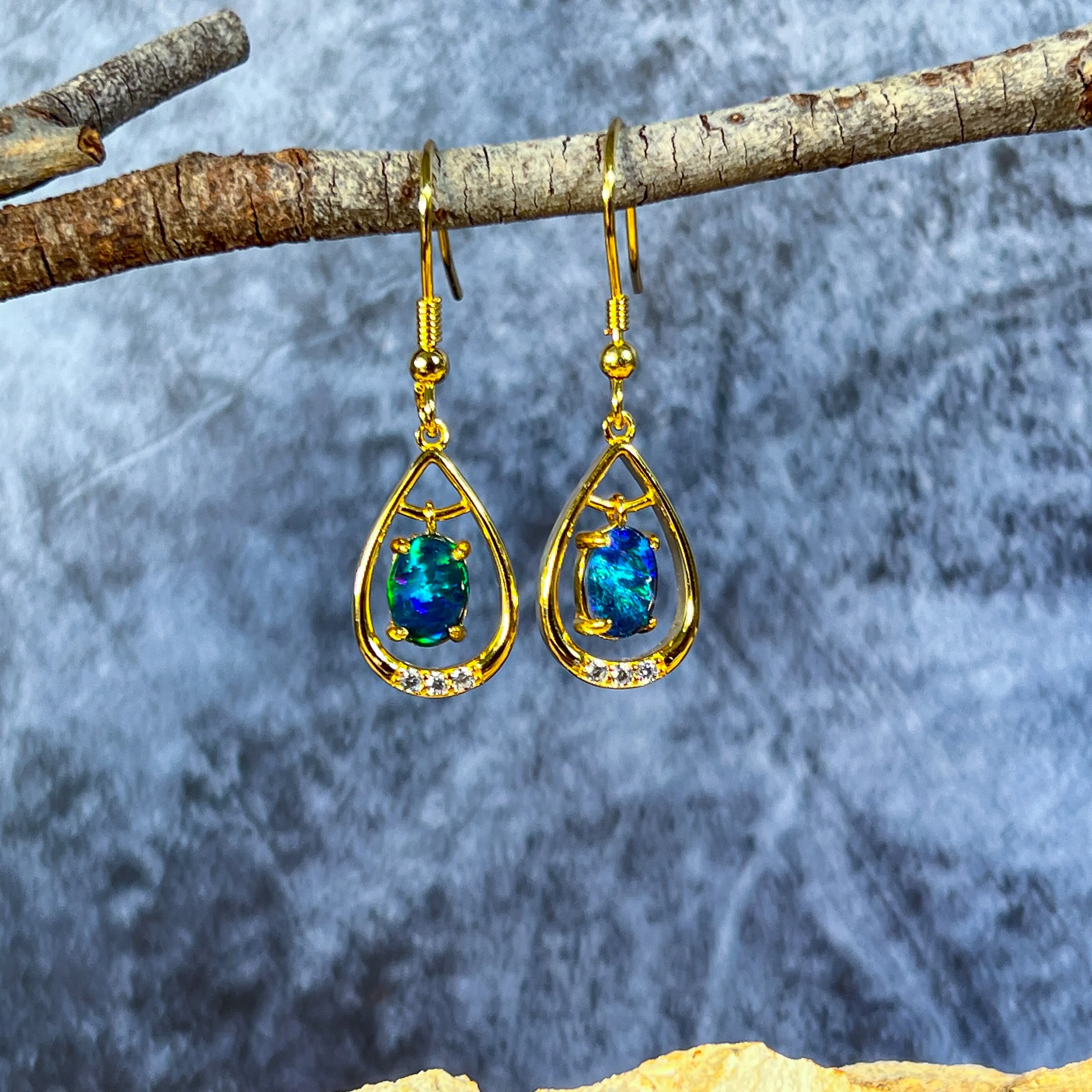 Gold Plated sterling Silver dangling pear shape earrings with two 7x5mm Opals