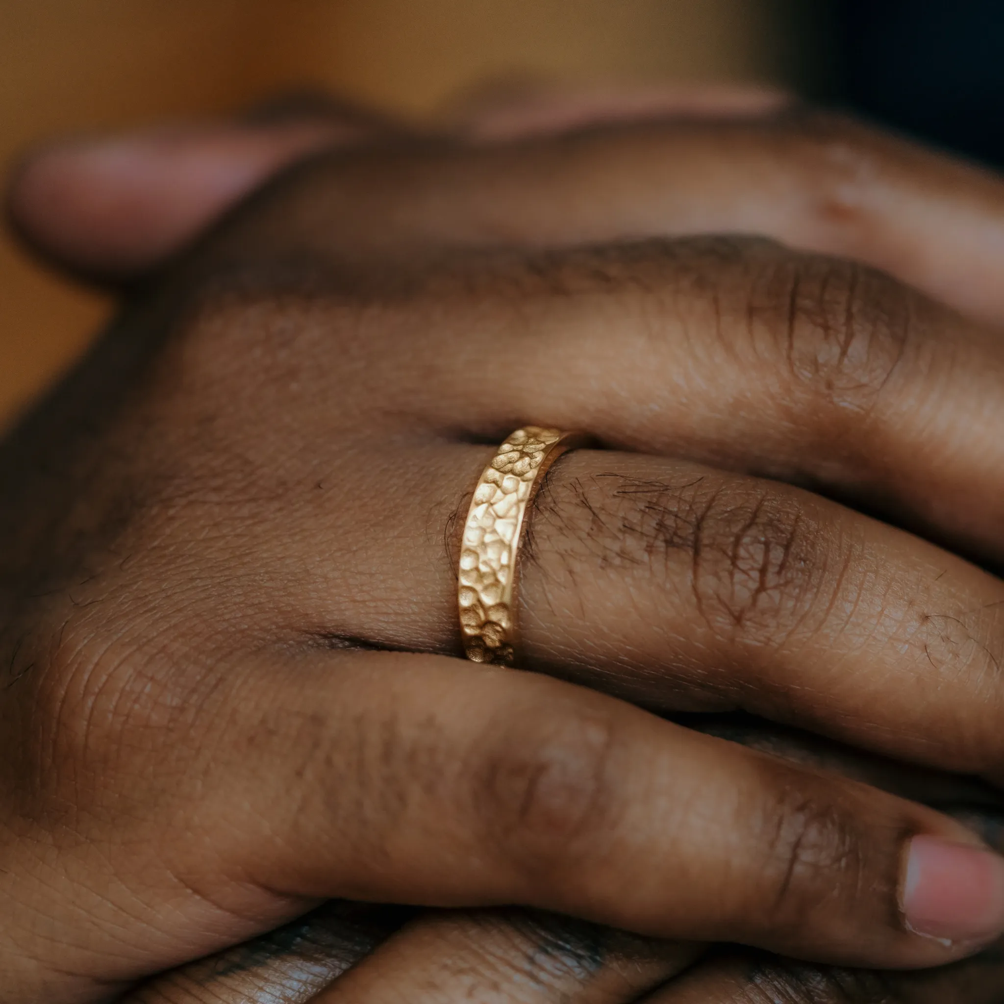 Hammered Men's Wedding Band In Gold