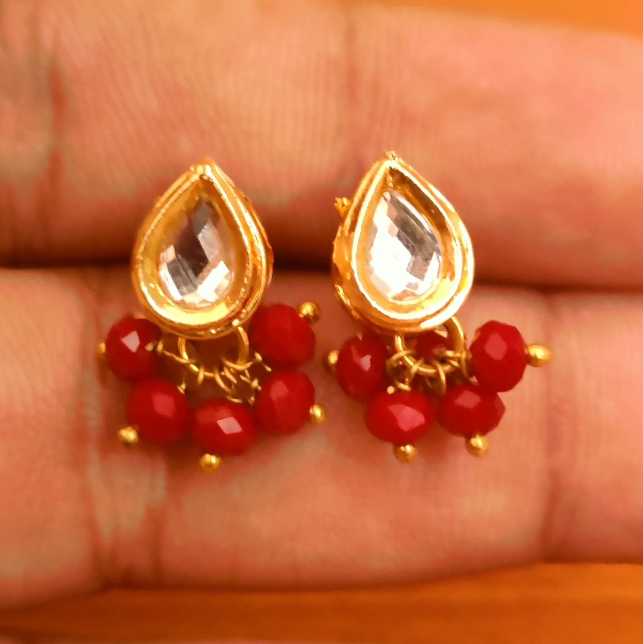 PEAR SHAPED KUNDAN MEENAKAR RED CRYSTAL STUDS