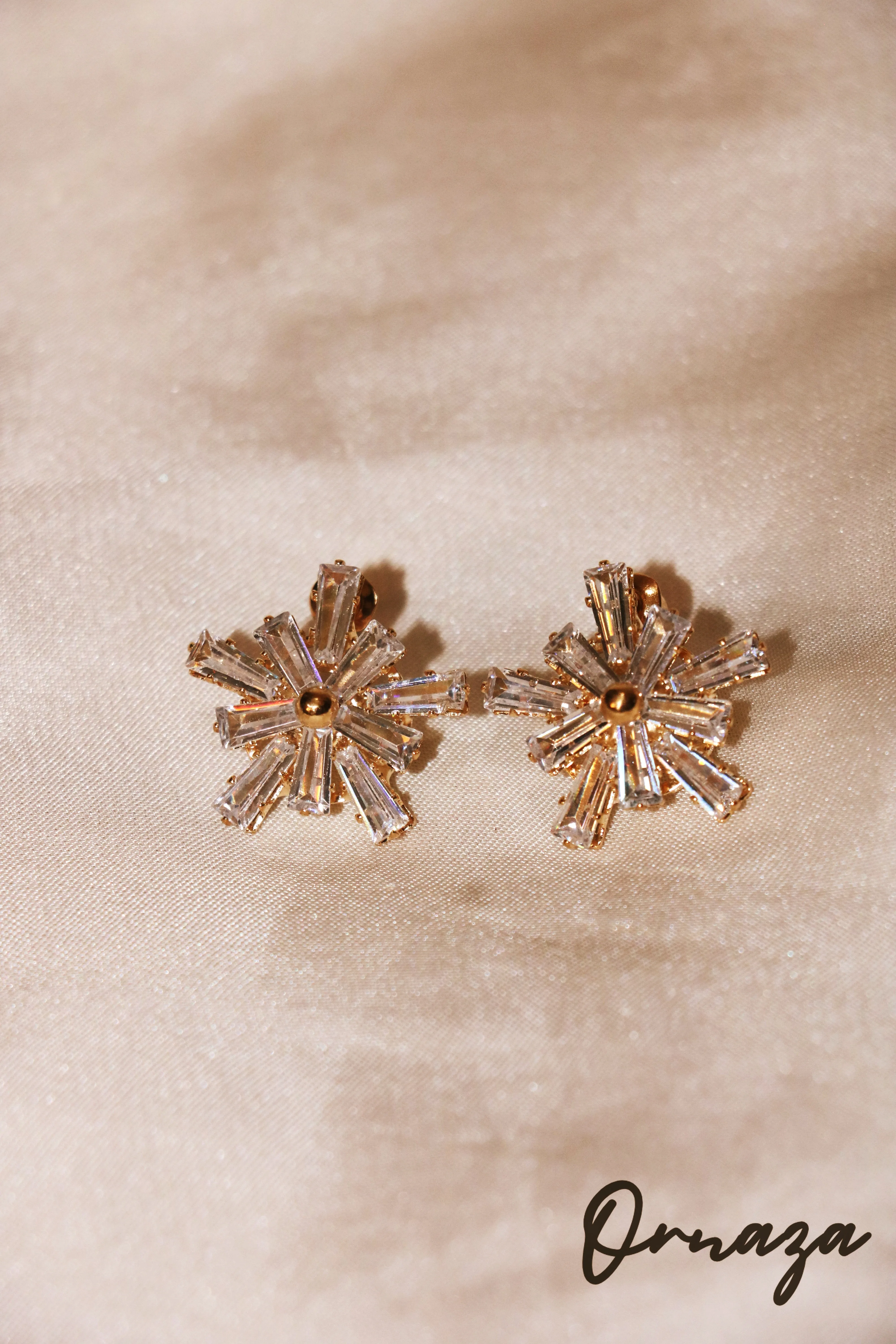 Radiant Starburst Stud Earrings – Dazzle with Elegance and Shine