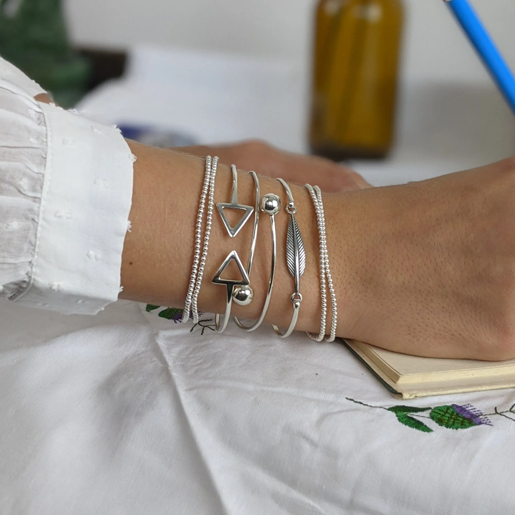 Sterling Silver Geometric Double Arrow Adjustable Torque Bangle